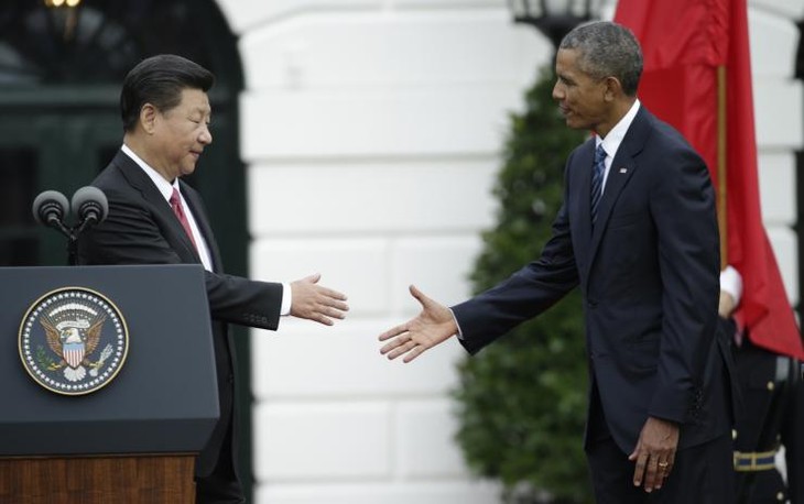 US, China reach anti-hacking and climate change agreement - ảnh 1